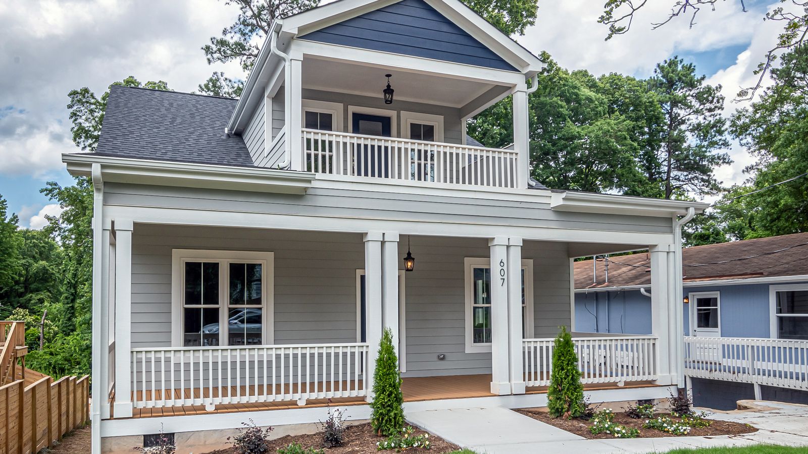 A two-storey Southern home with stacked front porches